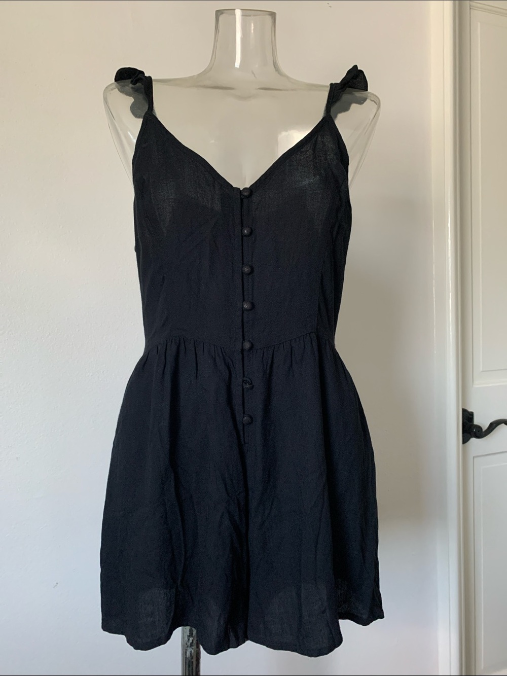Black Button-Front Romper with Adjustable Ruffle Straps